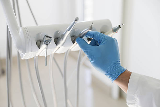 Professional Tooth Extraction technician working in Oblong, IL